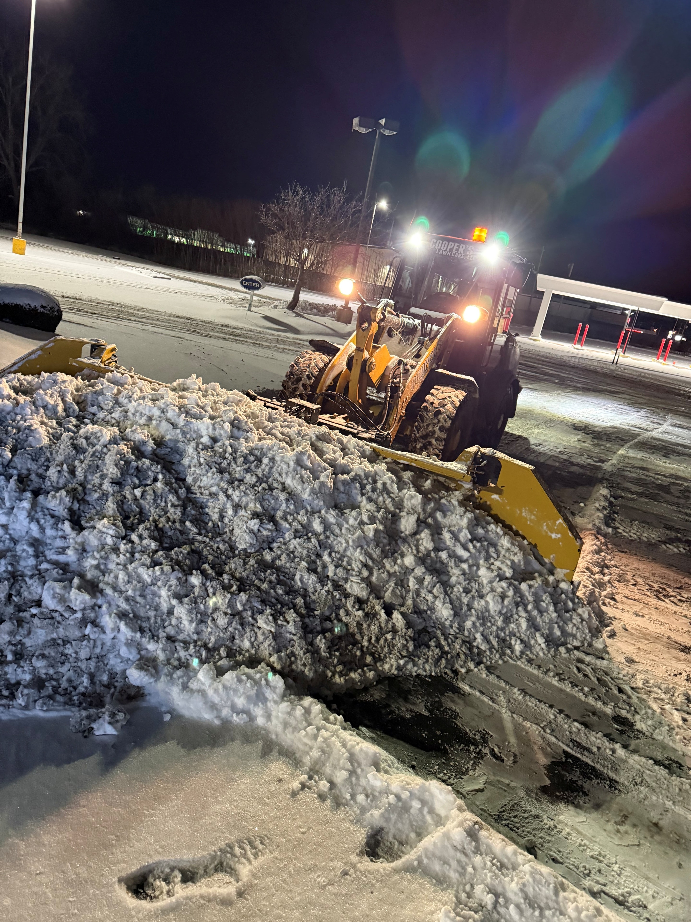 Commercial parking lot snow plow